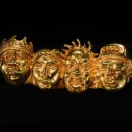 Designed by Johnny Nelson, the 14-karat Fingers of Def four-finger ring is from his Mount Rushmore series and honors four trailblazing male hip-hop artists: Biggie, Tupac, Ol’ Dirty Bastard, and Easy-E. Ice Cold: An Exhibition of Hip-Hop Jewelry is one of many art exhibits to see in NYC this summer.