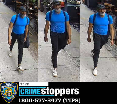 man in blue shirt, black pants wearing backpack wanted for assault in Manhattan