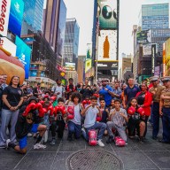 NYPD, Marines and kids in Times Square during Fleet Week