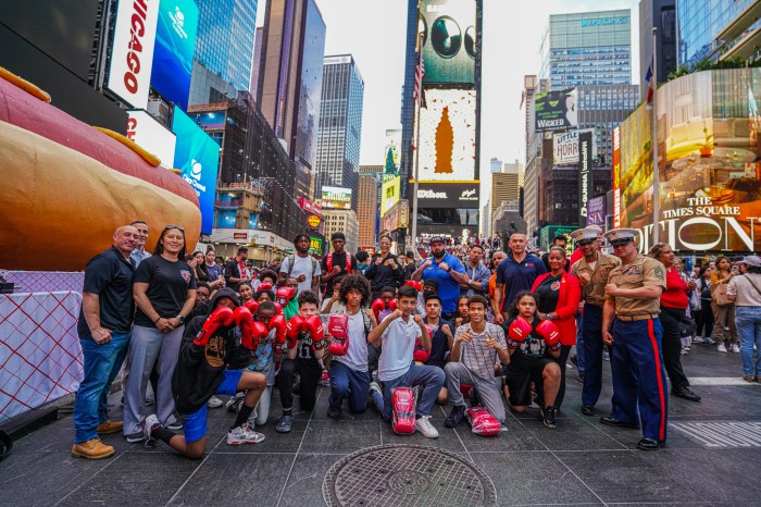 NYPD, Marines and kids in Times Square during Fleet Week