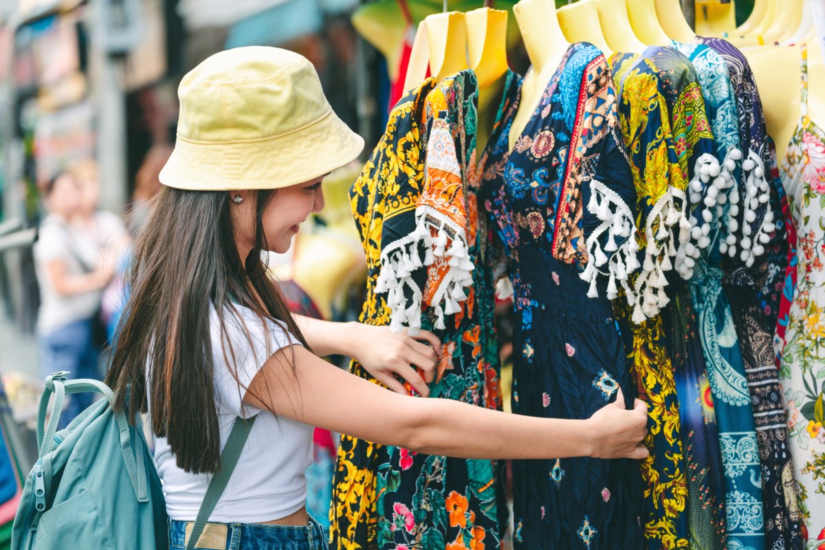 Traveler woman in shopping street market