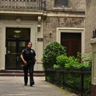 Brooklyn police officer walks away from apartment building