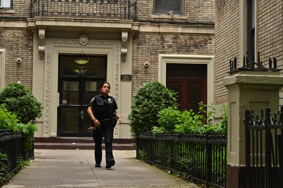 Brooklyn police officer walks away from apartment building