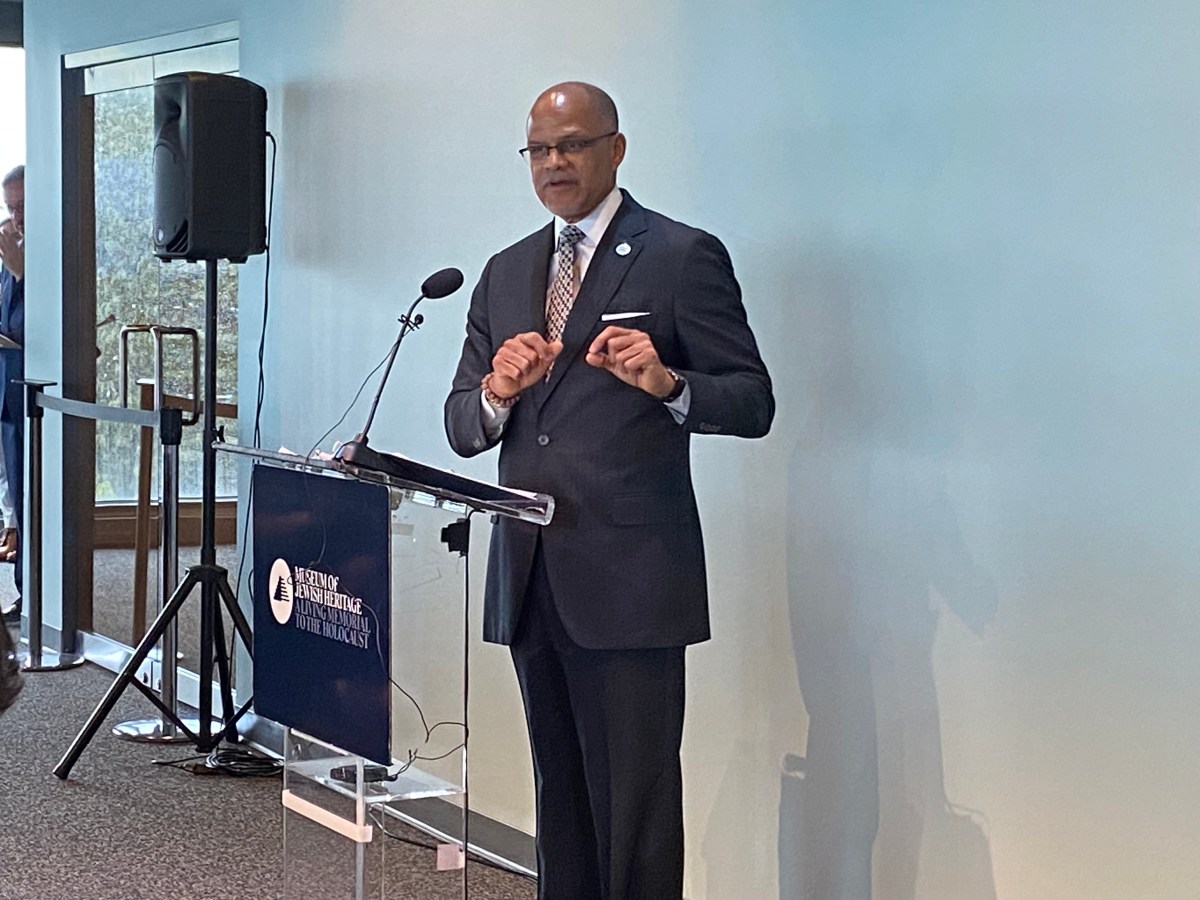 School Chancellor David Banks at a podium inside the Museum of Jewish Heritage