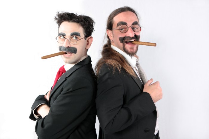 two performers dressed as Marx Brothers
