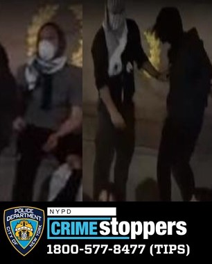 suspects in dark clothes and masks who allegedly defaced a memorial in Central Park 