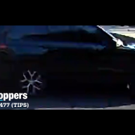 dark colored SUV in the Bronx in daytime
