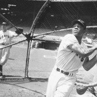 Willie Mays swinging a bat as a New York Giant