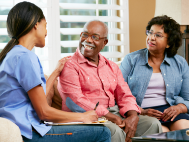 A patient and his wife with nurse