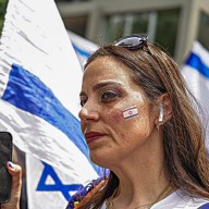 Israel woman and flag marching at Salute to Israel Parade