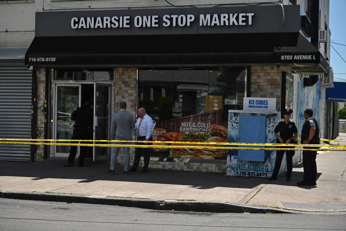 Police seal off Brooklyn bodega shooting scene