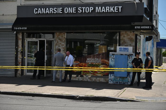 Police seal off Brooklyn bodega shooting scene