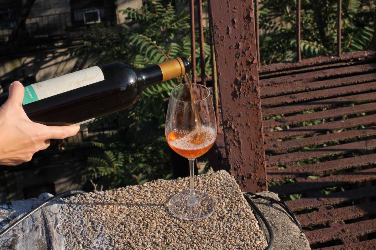 Orange Wine Pouring.
