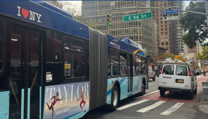 Second Avenue's existing curbside bus lane (seen here blocked by a parking scofflaw) will be upgraded to an offset lane.