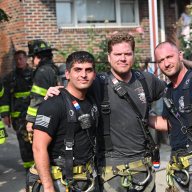 Brooklyn probationary firefighter with colleagues after saving man