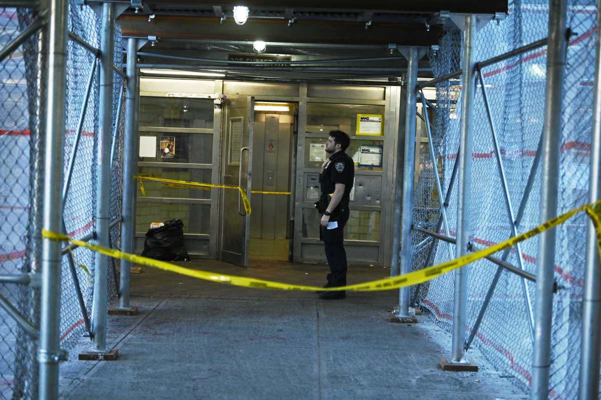 Officers stand guard at scene of Brooklyn shooting