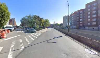 Bronx street with cars in daytime