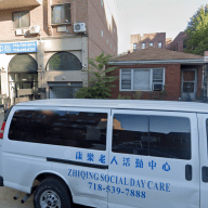 residential block in Queens with a van parked out front where a robbery occurred