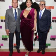 Three people at Times Square gala event
