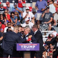 Donald Trump with secret service agents after assassination attempt