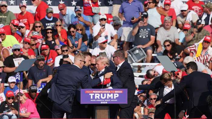 Donald Trump with secret service agents after assassination attempt