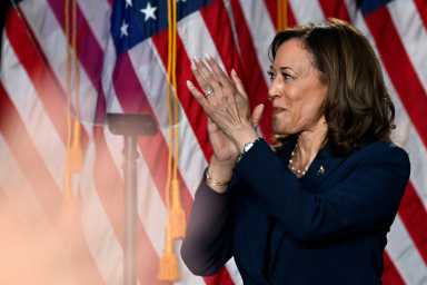 U.S. Vice President Kamala Harris applauds during a campaign event at West Allis Central High School, in West Allis, Wisconsin, U.S., July 23, 2024. REUTERS/Vincent Alban