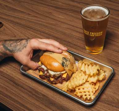 A burger with fries