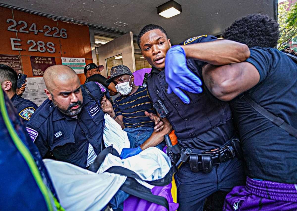 Kips Bay locals brutally beat the man on Monday accused of killing a woman and dumping her body in the trash.