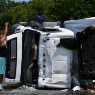 A worker responds to Bronx truck crash