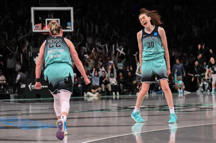 Two women basketball players