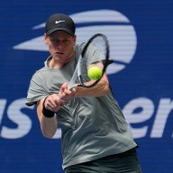 Jannik Sinner returns a backhanded shot during the second round of the 2024 US open