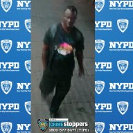 man wearing all black and a backpack in the Bronx