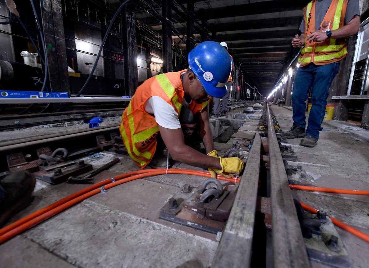 Construction crews work on the G train tracks near Court Square on Aug. 6.