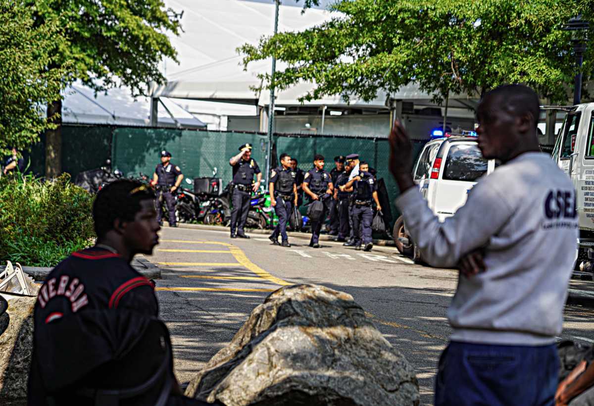 Police at the Randall's Island migrant shelter.
