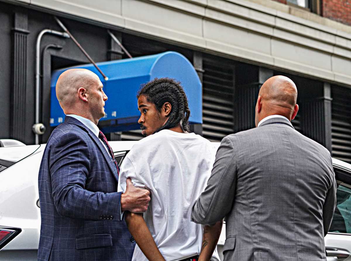 The alleged gang member who shot two NYPD sergeants after a gunpoint robbery in Lower Manhattan was charged Friday, 24 hours after he pulled the trigger, authorities said.