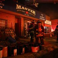Firefighters battle Queens two-alarm fire, find chemical drums