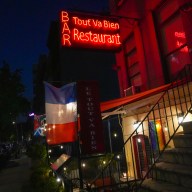 The exterior of Le Tout Va Bien French bistro in Manhattan