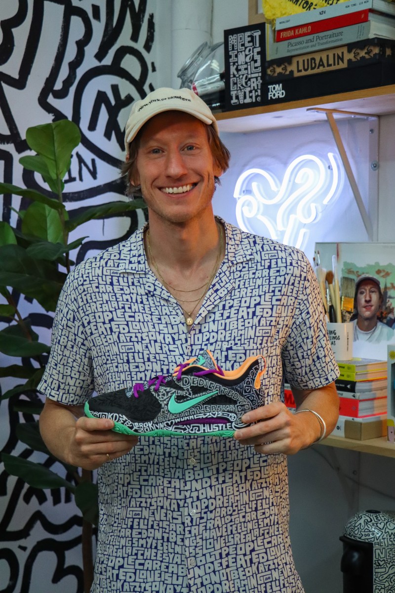Artist Timothy Goodman eats, sleeps and breathes for New York City 5 Timothy Goodman holding a sneaker