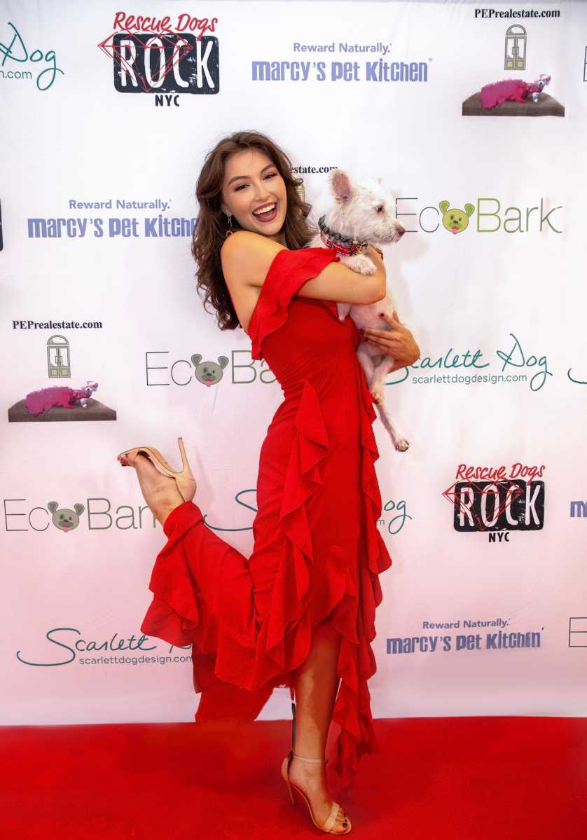 A women holding a dog
