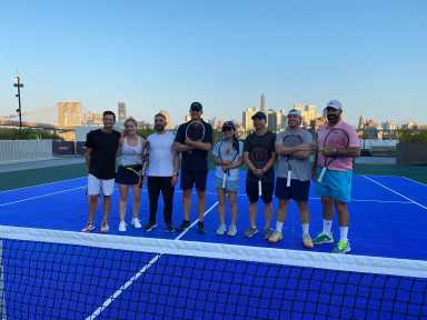 US Open winner, Andy Roddick, fourth from left, held a tennis clinic in Lower Manhattan.