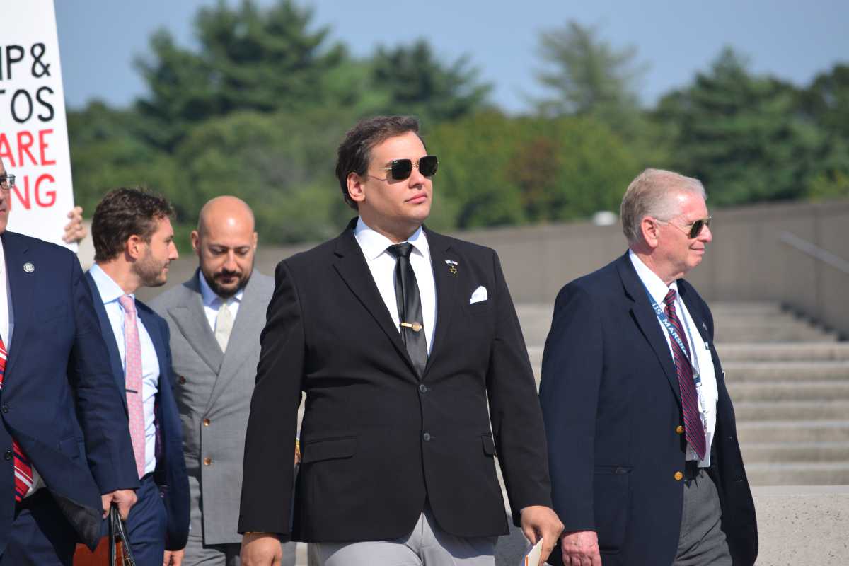 Former Congress Member George Santos outside U.S. District Court in Central Islip, LI on Aug. 19, 2024 after pleading guilty to fraud charges.