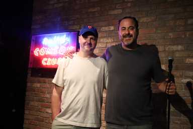 E Scott Lindner (l.) and Emilio Savone celebrate 10 years of ownership and the grand opening of the New York Comedy Club's fourth location.