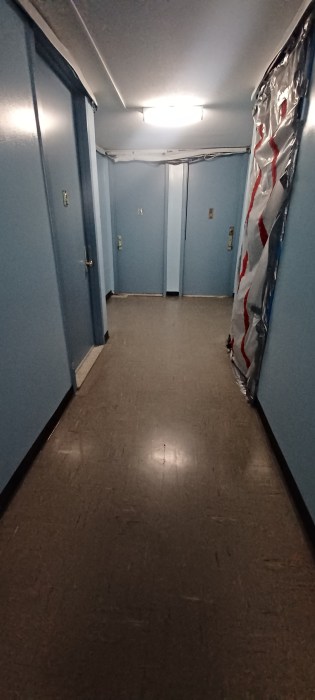 Disabled veteran's home still in disrepair 2 years after Queens fire 2 the hallway in a Queens apartment building