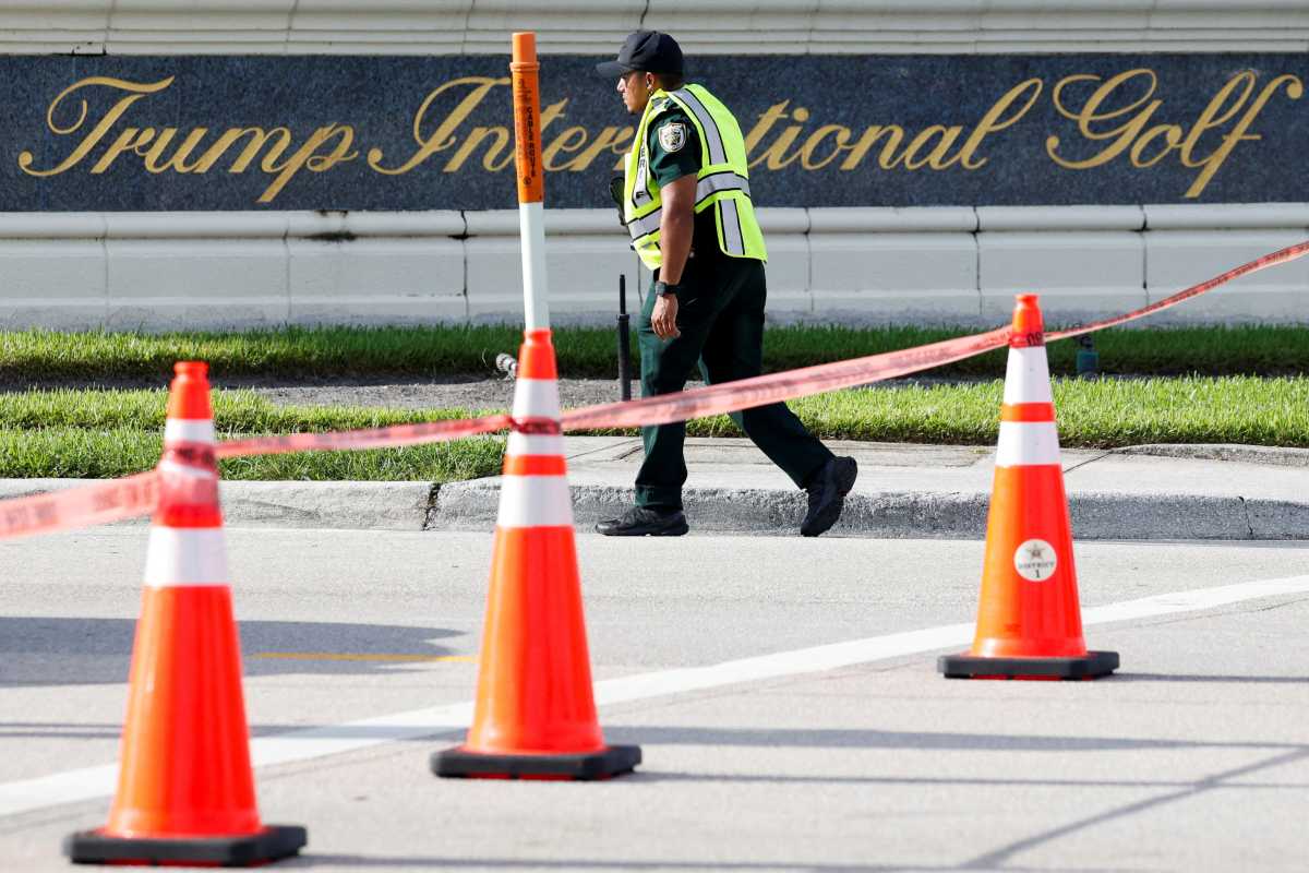 A law enforcement officer walks after reports of shots fired outside Republican presidential nominee and former U.S. President Donald Trump's Trump International Golf Course in West Palm Beach, Florida, U.S. September 15, 2024.