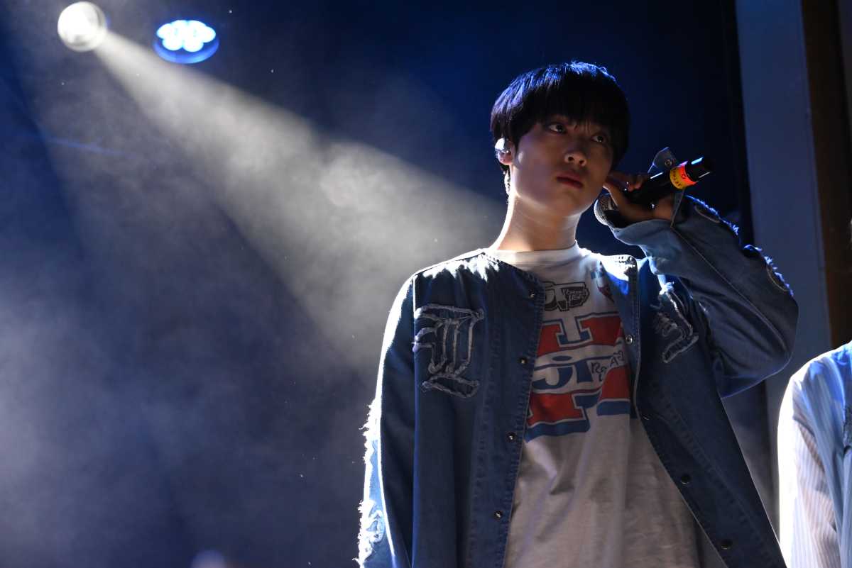 The KingDom gives royal K-Pop performance for fans at Webster Hall 11 Arthur checks his ear mic before preparing to sing