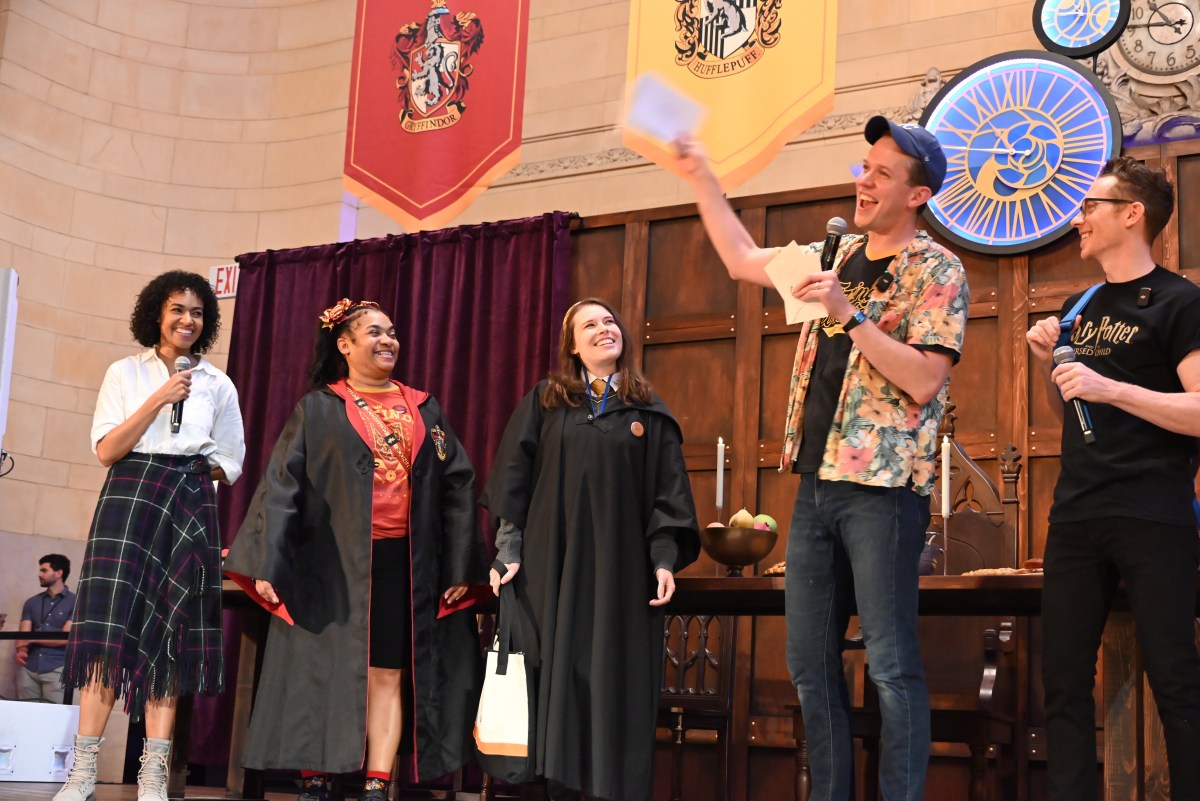 Grand Central Terminal celebrates 'Back to Hogwarts' with surprise appearance from Bonnie Wright and fan giveaways 2 Steve Haggard, Daniel Frederick, and Cara Ricketts, who play Harry, Ron and Hermione, respectfully, in "Harry Potter and the Cursed Child," with two fans.