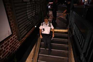 Police are searching for a gunman who shot a commuter to death inside a Brooklyn train station on Wednesday night.