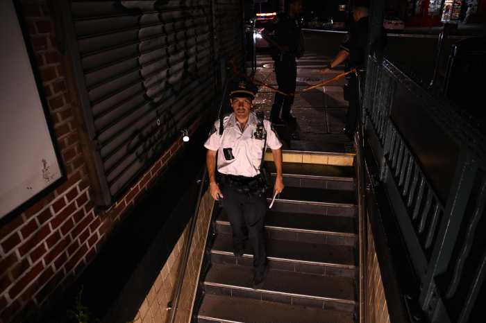 Police are searching for a gunman who shot a commuter to death inside a Brooklyn train station on Wednesday night.