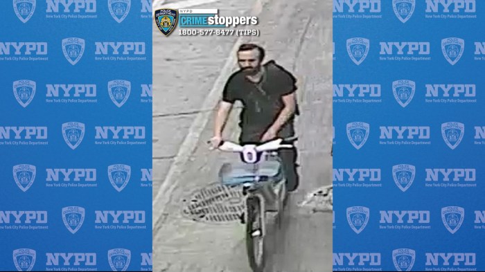 man wearing a black shirt on a bike in Central Park