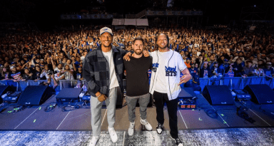 Josh Hart, Matt Hillman, and Jalen Brunson pose in Central Park during their live recording of the Rommates Show.